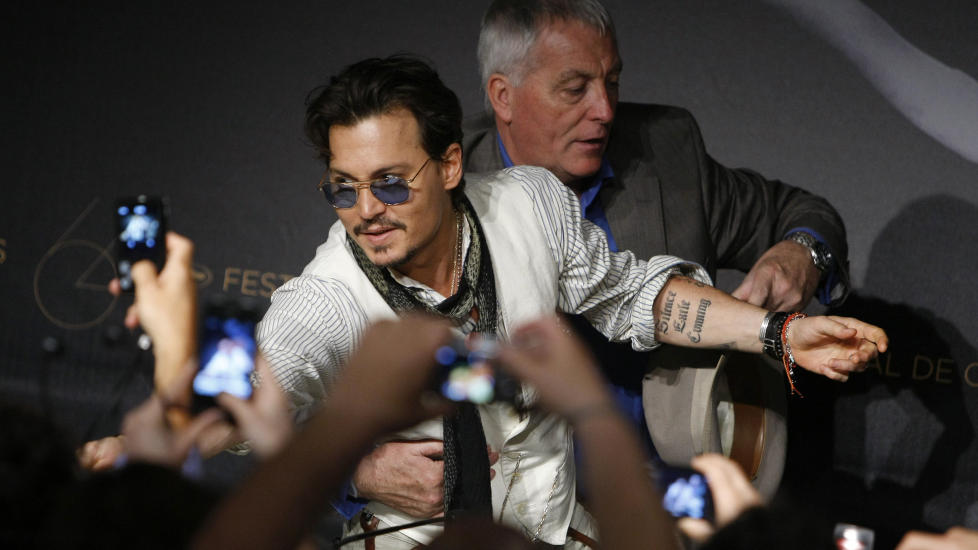 POPUL�R: Den var till�p til hysteri da Johnny Depp kom til Cannes for � vise sin siste film. Foto: AP Photo/Lionel Cironneau/SCANPIX