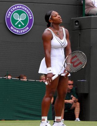 Tittelforsvareren utsl�tt i Wimbledon-comebacket