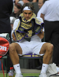 Federer med sjokk-exit mot Tsonga i Wimbledon