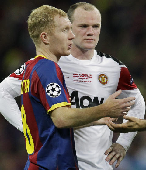 LYS�R BAK BARCA: Paul Scholes erkjenner at United var sjansel�se mot Barcelona. Men han tror Wayne Rooney kan bli like viktig for United som Messi er for katalanerne, selv om spissen var respektl�s da han krevde en overgang vekk fra Old Trafford forrige h�st. Foto: AP/Sang Tan
