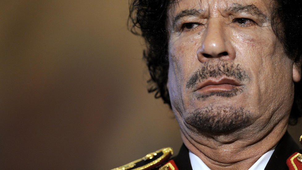 TRUER MED HEVN: Libyas leder Muammar Kadhafi truer med hevn om ikke Nato-landene slutter � bombe landet. Foto: AFP/Filippo Monteforte/Scanpix