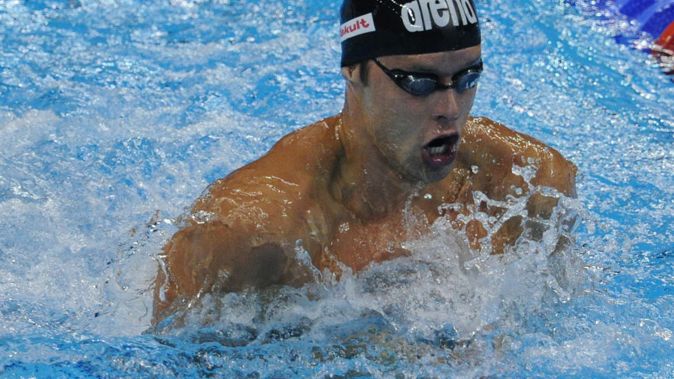 VILLE SETTE VERDENSREKORD: Alexander Dale Oen vant gull p� 100 meter bryst. Foto:  AFP PHOTO / MARK RALSTON