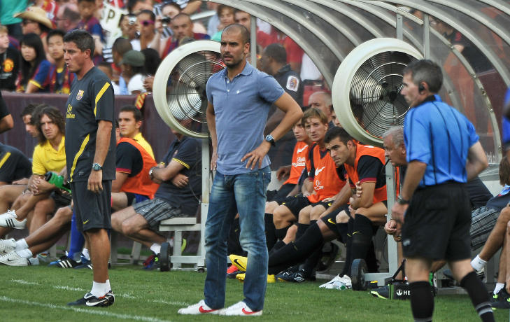 BEKYMRET: Pep Guardiola mener Barcelona har mye � jobbe f�r de er i rute til seriestart.Foto: SCANPIX/AFP PHOTO/Nicholas KAMM