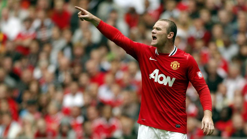 GULLTRO: Manchester United og Wayne Rooney tippes som gullvinnere i Premier League. Spissen nevnes ogs� som ligaens beste spiller av flere supporterklubber. Foto: EPA/KERIM OKTEN