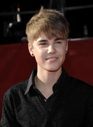 KJEKKAS: Justin Bieber er sv�rt popul�r verden over, b�de for sin sangstemme og utseende. Foto: Dan Steinberg/AP Photo/Scanpix