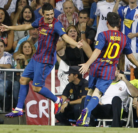 M�LSCORERE: David Villa (t.v) og Leo Messi scoret ett m�l hver og ga Barcelona et godt utgangspunkt f�r returkampen i Katalonia. Foto: REUTERS/Susana Vera