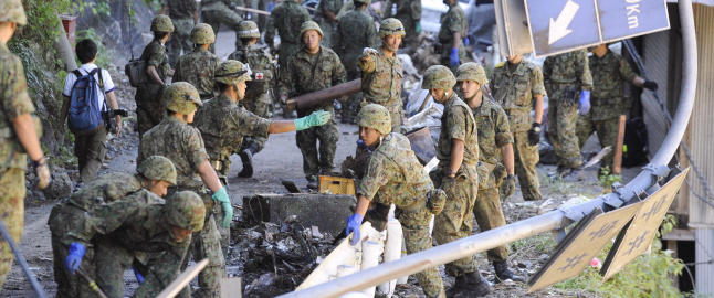 Over hundre d�de og savnet etter tyfon i Japan