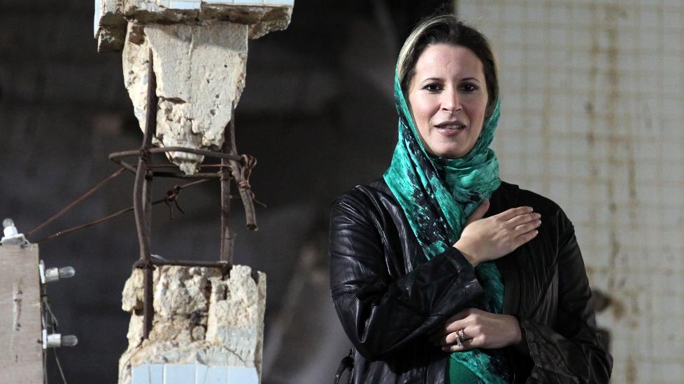 VIL VEKK: Muammar Kadhafis datter Aisha i Tripoli i sommer da hun pr�vde � mobilisere st�tte til den drepte faren. Aisha er n� i Algerie sammen med moren og to br�dre. N� vil diktatorens familie sl� seg ned i S�r-Afrika.Foto: EPA/MOHAMMED MESSARA.