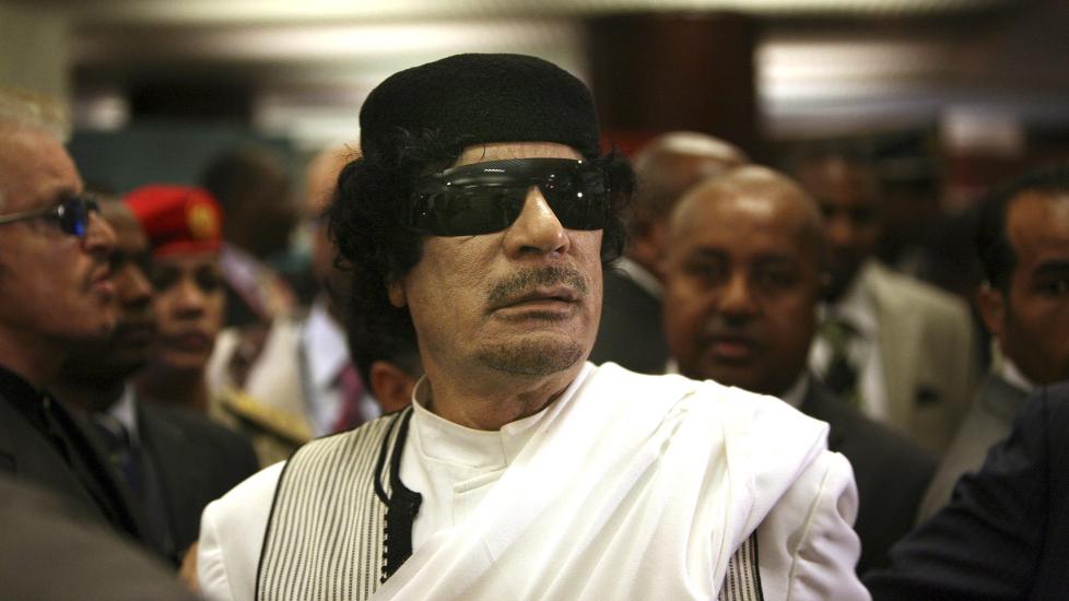 VAR EN HOLDEN MANN: Muammar Kadhafi, her fotografert under et m�te i den afrikanske union i 2009, hadde gjemt unna store verdier.  Foto: EPA/STR/Scanpix
