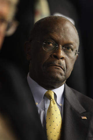 RADIKALT FORSLAG: Herman Cain vil ha en flat skatt p� ni prosent. Foto: Scott Olson/Getty Images/AFP/Scanpix