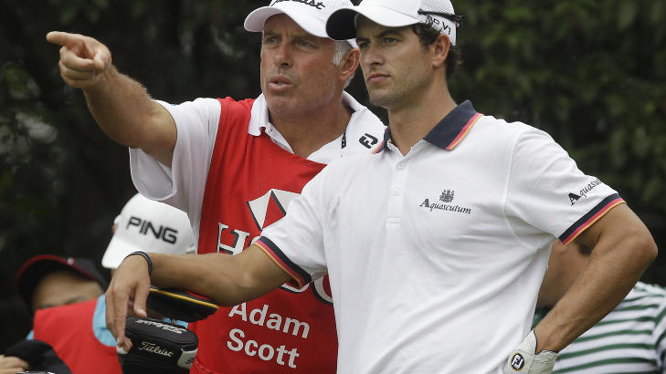 NY JOBB: Williams jobber n� sammen med det australske golfesset Adam Scott. Foto:  (AP Photo/Eugene Hoshiko)