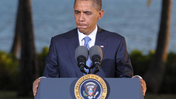 AVVISER TORTUR: Barack Obama holdt i natt norsk tid en pressekonferanse p� Hawaii, der han avviste bruk av s�kalt waterboarding og lovte � v�re hard i klypa med Iran. Foto: Saul Loeb/AFP/Scanpix