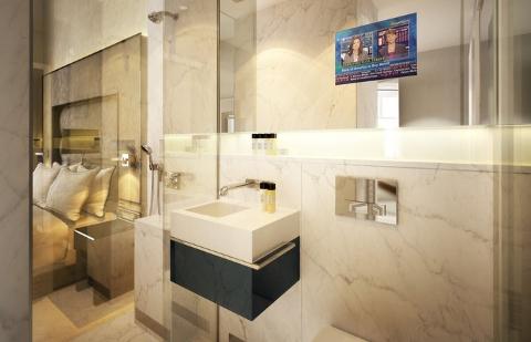 INNEBYGD TV: P� Eccleston Square Hotel er det innebygd tv-skjerm i baderomsspeilet, dermed kan du se BBC mens du sminker deg.