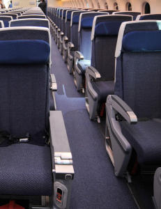 Hvor god plass kan du kreve om bord p� flyet?