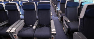 Hvor god plass kan du kreve om bord p� flyet?