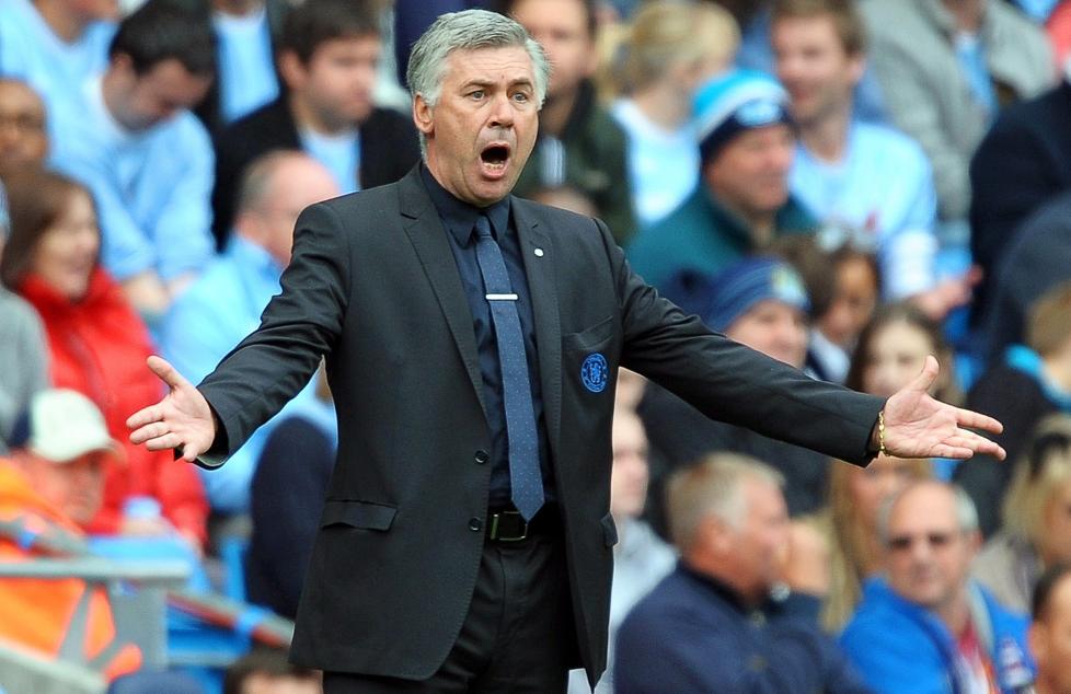 TILBAKE I JOBB: Sju m�neder etter at han fikk sparken i Chelsea, er Carlo Ancelotti klar for nye oppgaver i Paris Saint-Germain.Foto: SCANPIX/EPA/ROBIN PARKER
