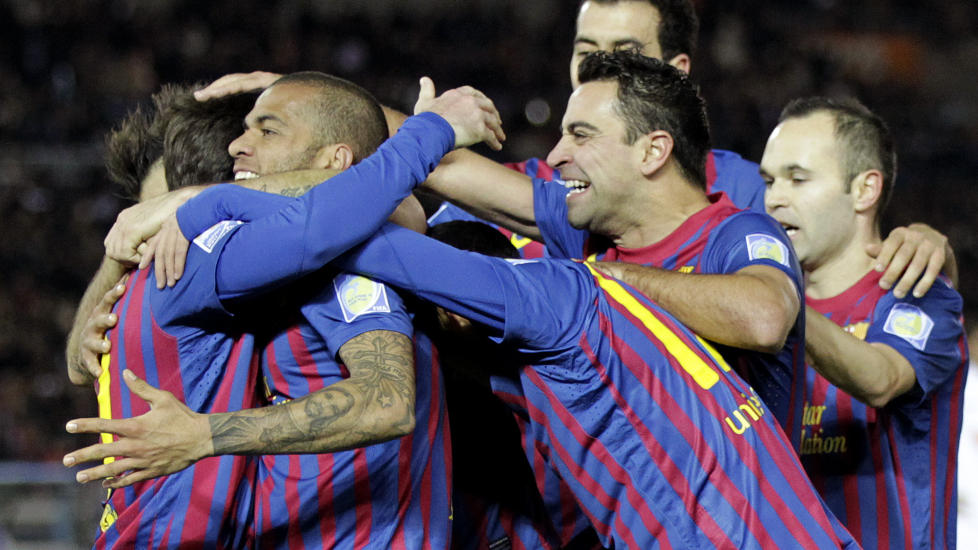 BEST: Ingen over, ingen p� siden. Barcelona utklasset brasilianske Santos med 4-0 og lekte seg til klubbens 13. s�lvvare p� tre og et halvt �r i fotballens klubb-VM s�ndag. Foto: AP Photo/Hiro Komae/Scanpix