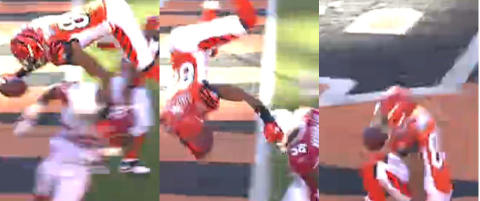 Hoppet salto over forsvarer for � score touchdown