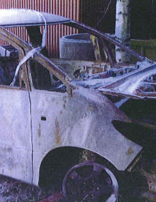 Familiefar (49) anklaget for � stjele og brenne sin egen bil