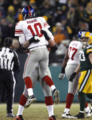 Eli Manning og Giants rystet tittelforsvaren