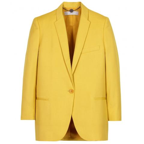 LUKSUS: Knallgul blazer fra Stella McCartney, sett p� Kirsten Dunst, til 7400 kroner hos Mytheresa.com. Foto: Mytheresa.com