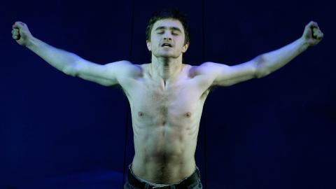 Daniel Radcliffe, who portrays Alan Strang in Equus, performs on stage during a photo call to promote his new play at the Gielgud Theatre in London's West End in this February 22, 2007 file photo.  REUTERS/Dylan Martinez/Files (BRITAIN)
