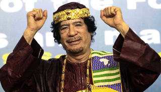 MUAMMAR KADHAFI:  Hans skj�nnlitter�re produksjon romantiserer det tradisjonelle libyske samfunnet og viser skepsis til det moderne. Foto: Reuters/Scanpix