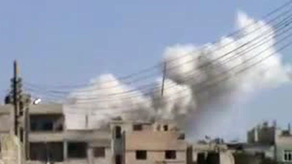 STORE EKSPLOSJONER: Det meldes i dag om store eksplosjoner i den syriske byen Homs. Her et bilde fra s�ndag. Foto: AFP