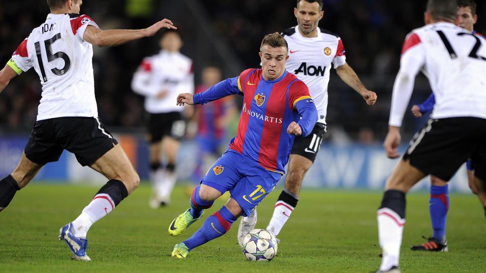 KOSTER OVER 100 MILLIONER: Xherdan Shaqiri (midten) har skrevet under en fire�rskontrakt med Bayern M�nchen. Overgangssummen er ikke offentliggjort, men det ansl�s at 20-�ringen koster 13 millioner euro - eller 102 mill. kroner. Foto: AFP/FABRICE COFFRINI