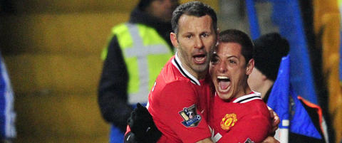 Giggs tar enda et år i United