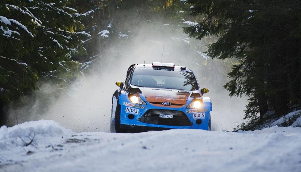 PRIVATF�RER: Mads �stberg og kartleser Jonas Andersson har notert pr�veseier og ligger meget godt plassert til service i Hagfors. Foto: AFP/JONATHAN NACKSTRAND