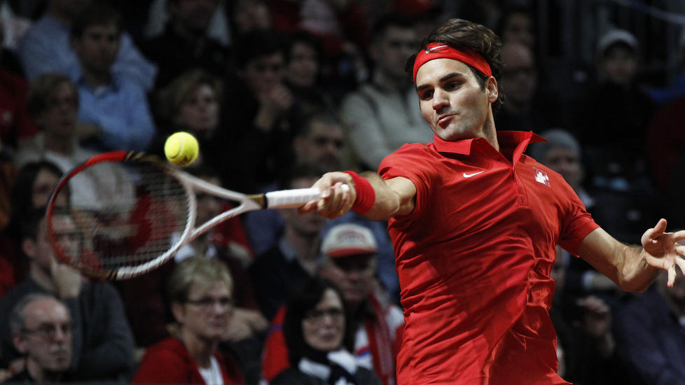 SJELDEN KOST: Roger federer hadde 15 strake seire i Davis Cup f�r dagens tap for John Isner. Foto: Michael Buholzer/REUTERS/SCANPIX