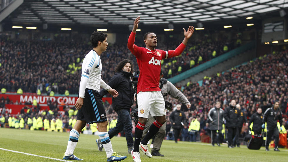 - EN SKAM: Alex Ferguson slakter Luis Suarez for ikke � ha tatt Patrice Evra i h�nda. Han mener ogs� at Patrice Evra ikke burde feiret foran Suarez etter kampen. Foto: AP Photo /Jon Super / Scanpix