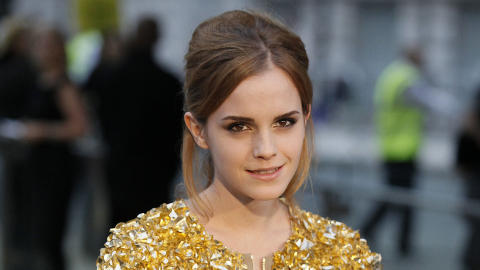 LANGE LOKKER: Under ett �r etter dette bildet ble tatt p� London Fashion Week i 2009, lot Watson lokkene falle. Foto: Shaun Curry / AFP Photo / Scanpix