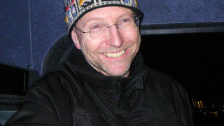 NORDLYSBUSSEN: Ivar er den blide bussj�f�r som tar med turistene p� nordlysbussen. Foto: KIRSTEN M. BUZZI