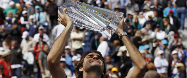 Tre p� rad for Federer i storform
