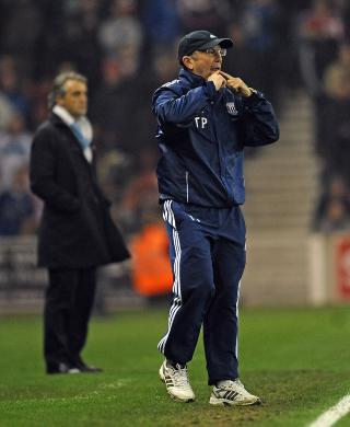 AVVISER AT MANCINI HAR GRUNN TIL Å KLAGE: Stoke-manager Tony Pulis mener de ble snytt for straffe. Foto: AFP PHOTO/PAUL ELLIS AVVISER AT MANCINI HAR GRUNN TIL Å KLAGE: Stoke-manager Tony Pulis mener de ble snytt for straffe. Foto: AFP PHOTO/PAUL ELLIS