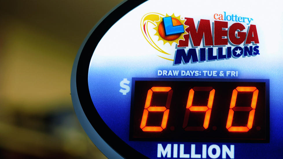 REKORD-GEVINST: Mega Millions hadde 30. mars en rekordtrekning p� 640 millioner dollar (3,7 milliarder kroner). Gevinsten ble delt p� tre heldige vinnere. Foto: Kevork Djansezian / Getty Images / AFP / NTB Scanpix