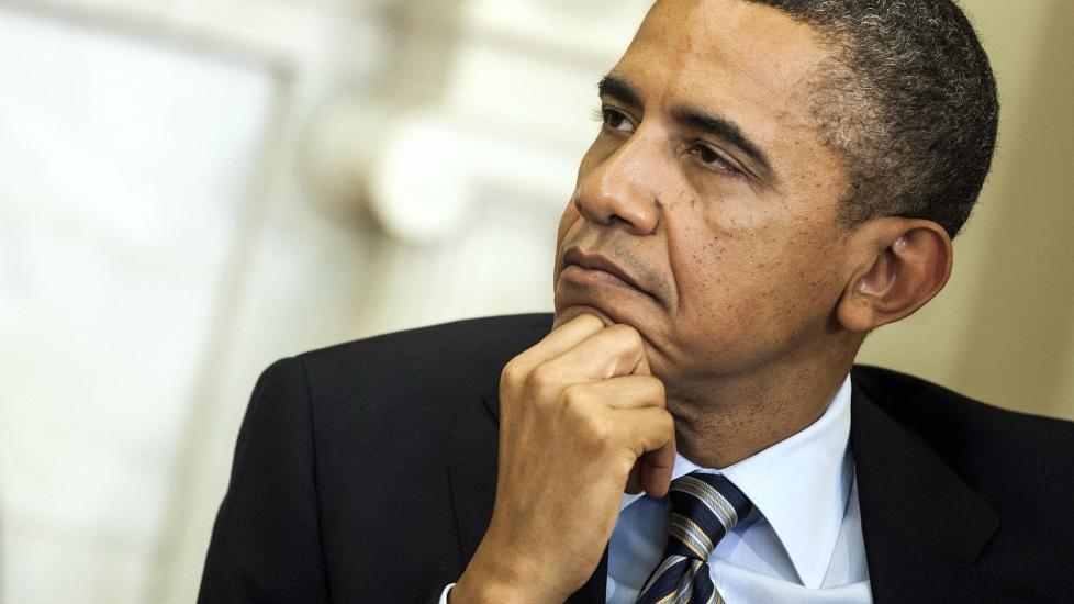 IKKE KANYE-FAN: President Barack Obama er ikke i tvil om hvem han foretrekker blant Kanye West og Jay-Z. Og drittsekk-stempelet han ga West i 2009 holder han fast ved enn�. Foto: Brendan Smialowski / AFP / Scanpix