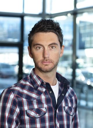 HØYE MÅL: Målet er å være verdens ledende premiumprodusent av elektriske biler i 2020. Her er den norske informasjonssjefen Marius Tegneby. Foto: Harald A. Møller HØYE MÅL: Målet er å være verdens ledende premiumprodusent av elektriske biler i 2020. Her er den norske informasjonssjefen Marius Tegneby. Foto: Harald A. Møller