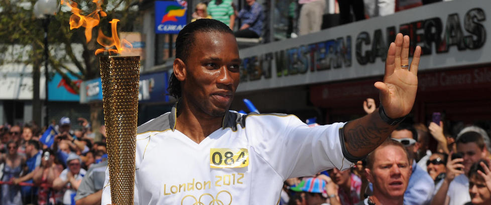 Drogba ble hyllet da han bar den olympiske ilden