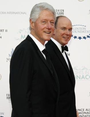 Clinton poserte med pornostjerner