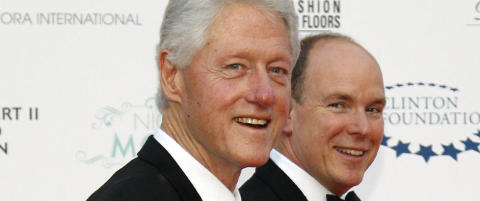 Clinton poserte med pornostjerner