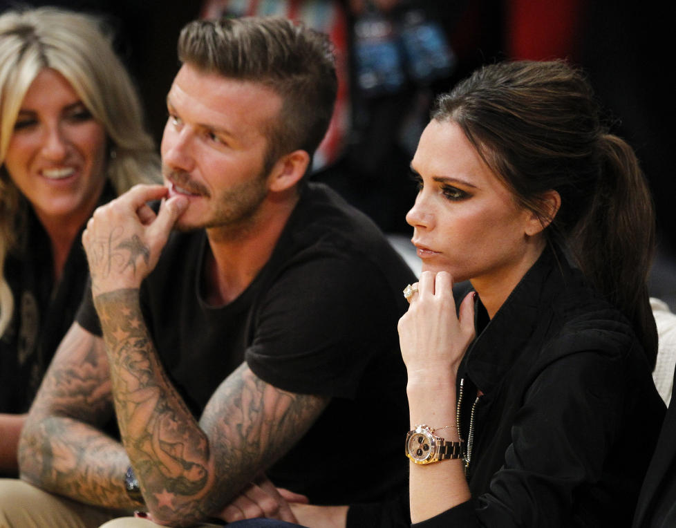 - ER LYKKELIG: Victoria Beckham skj�nner at folk kanskje mener hun ser ut som en surpomp, men n� forteller hun at hun egentlig er veldig lykkelig og at det er et image hun har skapt selv. Foto: Stella Pictures