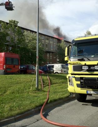Brann i boligblokk i Trondheim