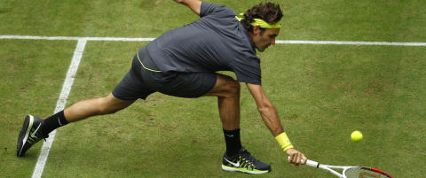 Roger Federer gikk p� �rets f�rste finaletap