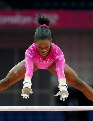 Gabrielle (16) tidenes f�rste afroamerikanske gullvinner i turn