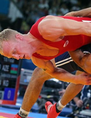 Berge kjempet mot t�rene etter OL-tap