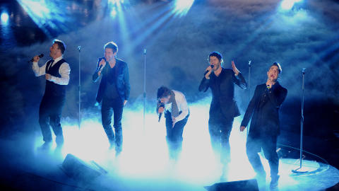 SUKSESSBAND: Gary Barlow (f.v.), Howard Donald, Jason Orange, Mark Owen og Robbie Williams hadde en eventyrlig suksess p� 90-tallet. Foto: TIZIANA FABI / AFP / NTB Scanpix