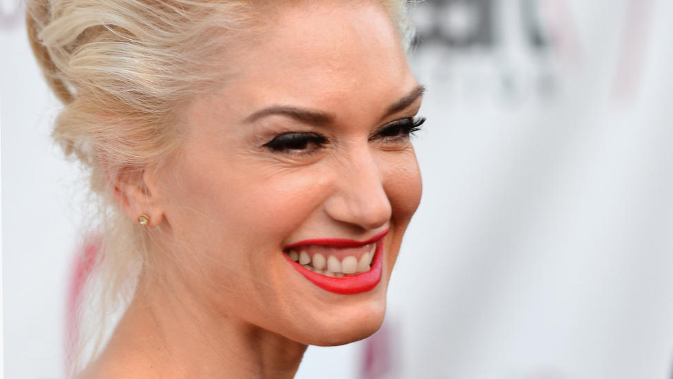 BER�MTE LEPPER: Gwen Stefani fotograferes sjeldent uten sminke, og er spesielt kjent for � bruke knallr�de leppestifter. Foto: Alberto E. Rodriguez / Getty Images / AFP / NTB Scanpix